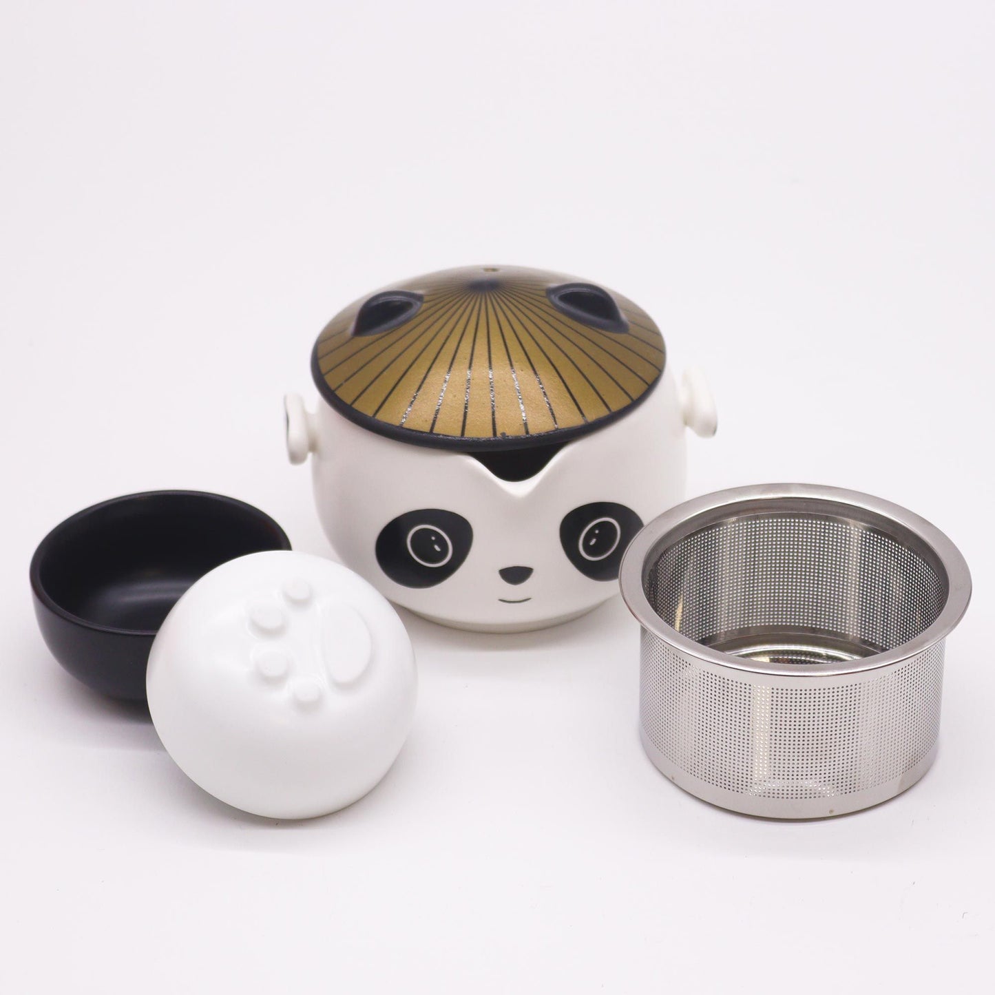 Ceramic tea pot with panda design on a white background